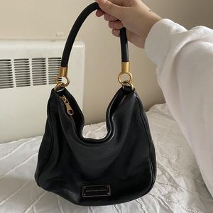 Very much like new  Jacobs black leather